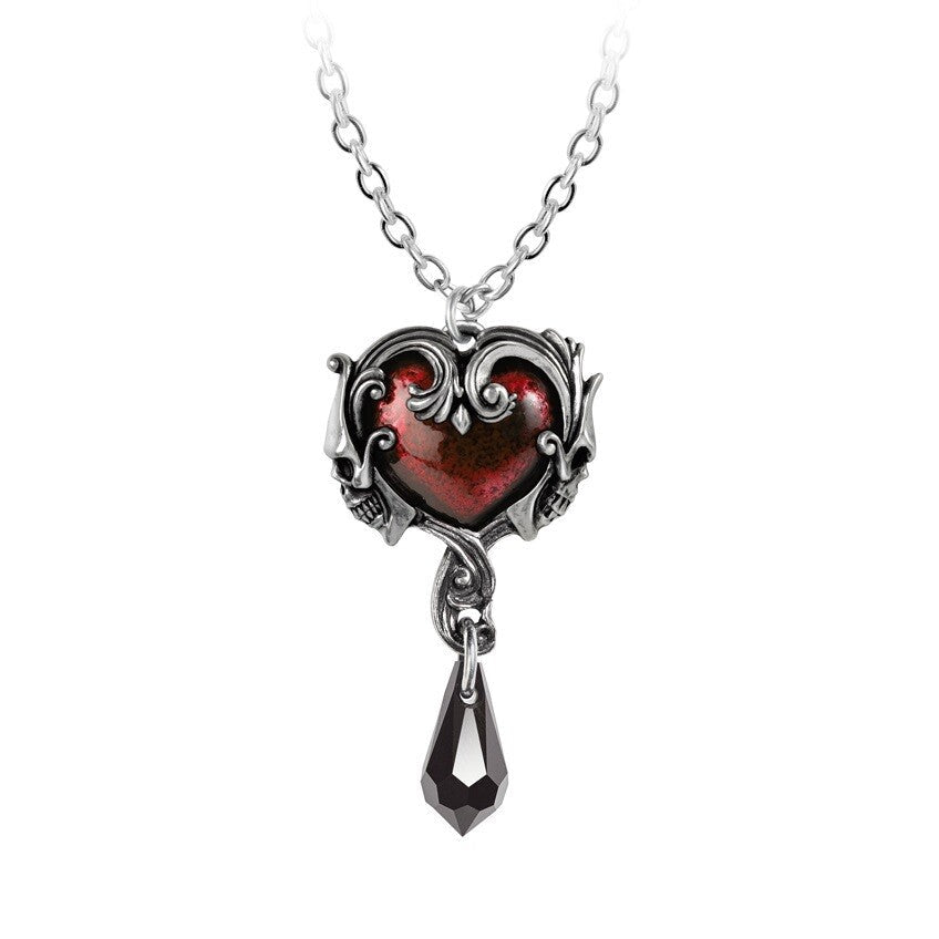 Heart-shaped pendant with red center and silver chain on white background
