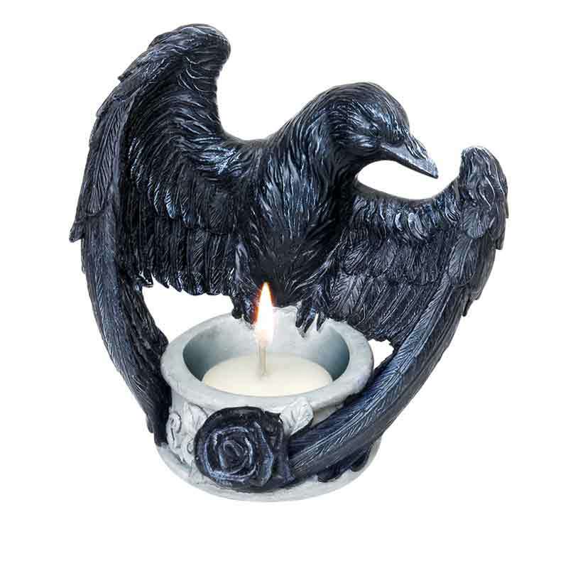 Decorative candle holder with an eagle design on a white background