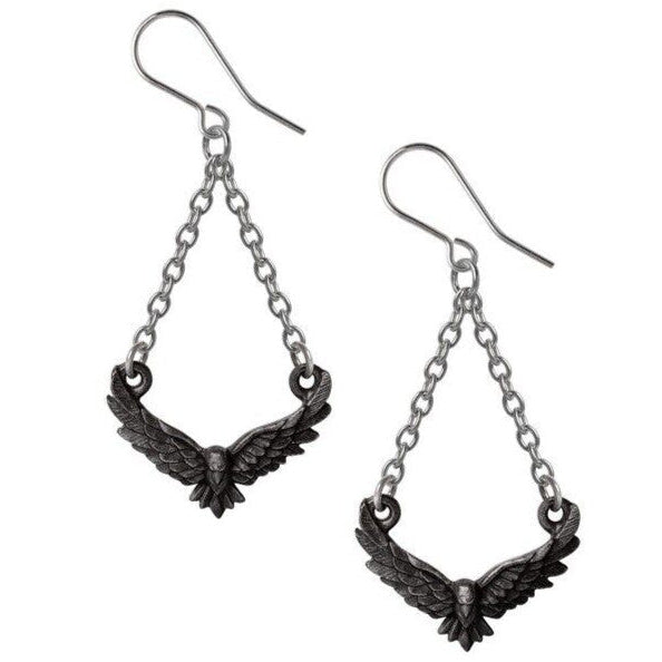 Pair of black winged earrings with chain designs on a white background