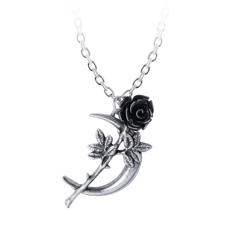 Silver necklace with a black rose and crescent moon pendant on a white background