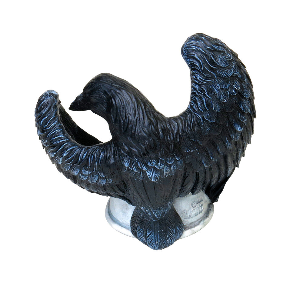 Black and blue rooster figurine on a white background