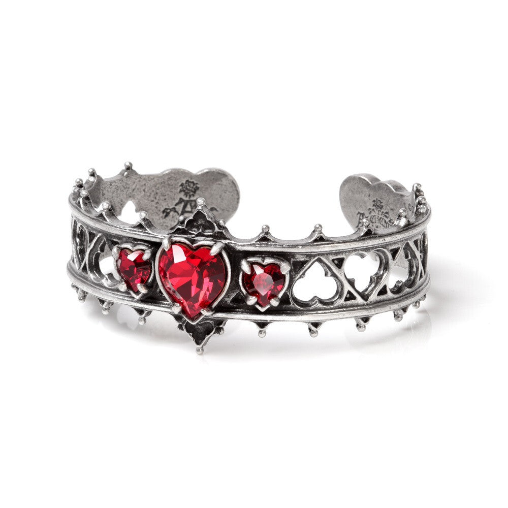 Silver bracelet with red heart stones on a white background