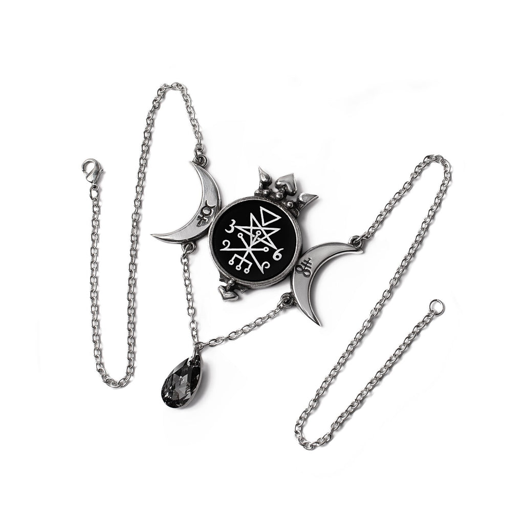 Necklace with a black and silver pendant on a white background