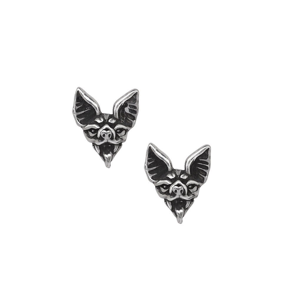 Pair of silver bat-shaped earrings on a white background