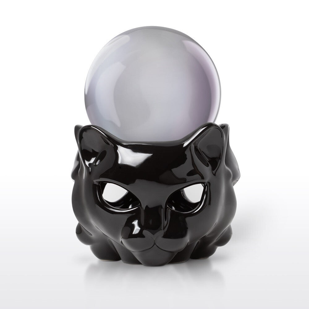 Black cat-shaped object with a crystal ball on a white background