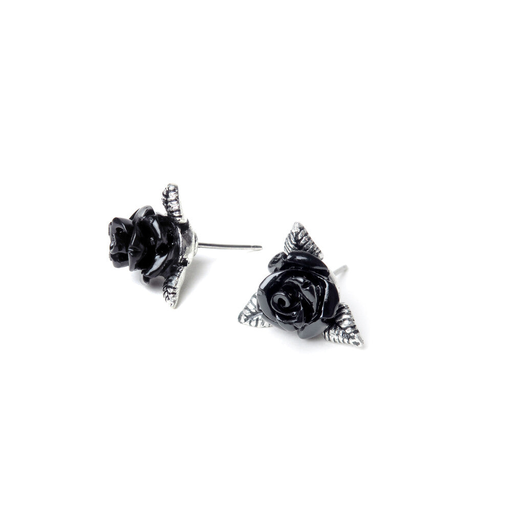 Black rose-shaped earrings on a white background
