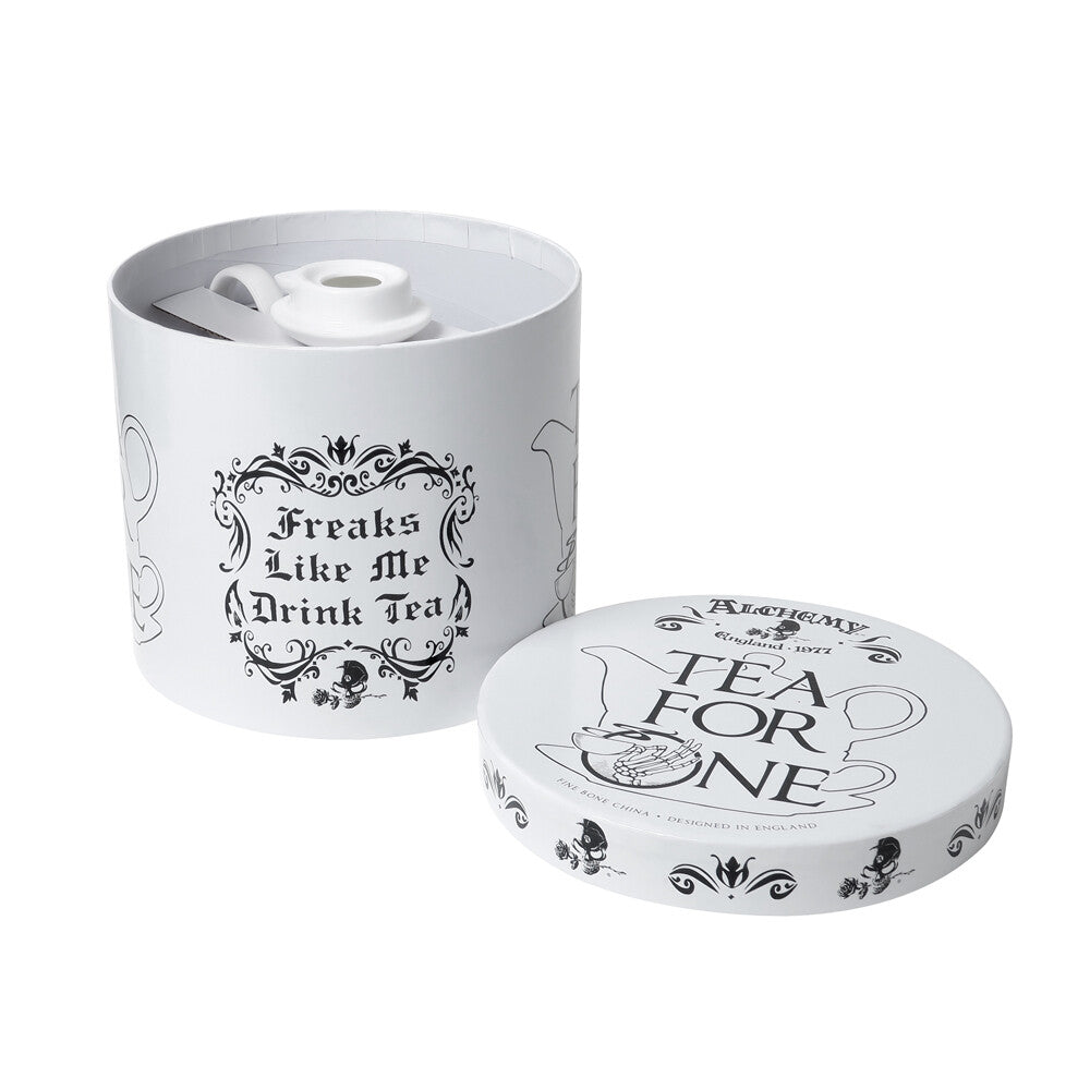 Tea for one set with a white container and lid on a white background