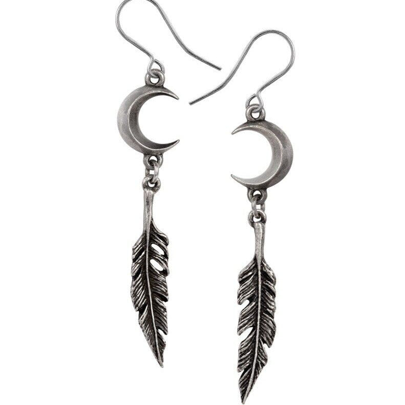 Silver earrings with crescent moon and feather designs on a white background