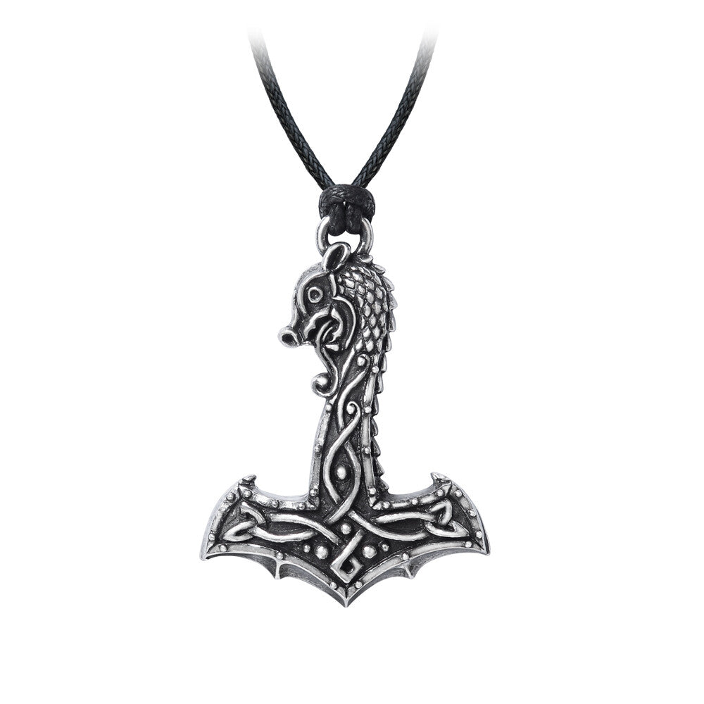 Thor's hammer pendant on a black cord against a white background