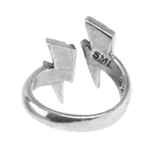 A silver lightning bolt ring with an adjustable split band, featuring the engraved initials 'SML' on one side.