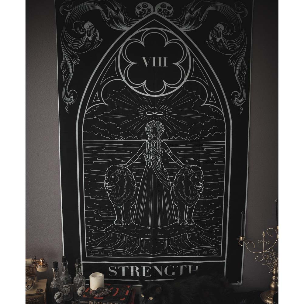 Decorative tarot card with 'Strength' and number '8' design on a dark background.