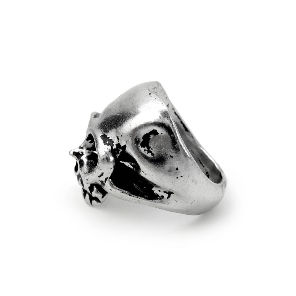 Silver ring with a unique design on a white background