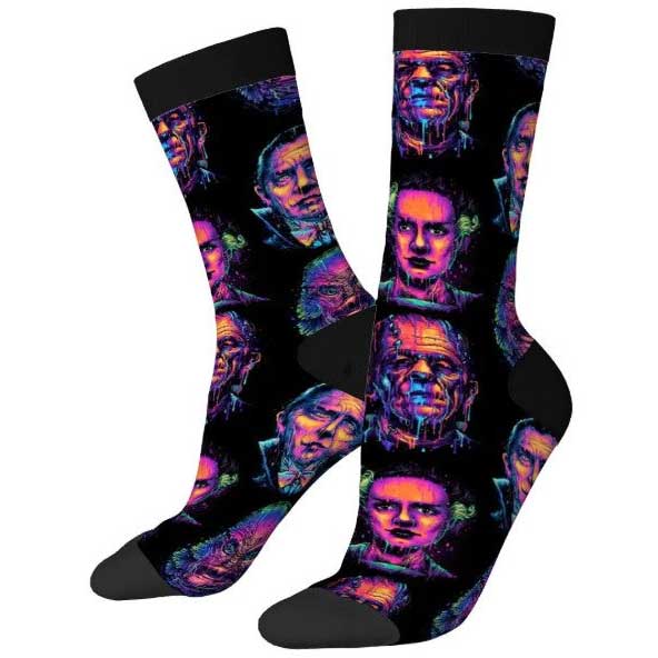 Colorful socks with a pattern of faces on a white background